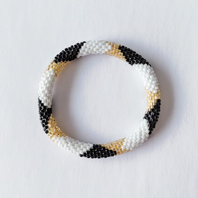 Bracelet népalais #1 (blanc, noir et doré)