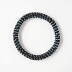 Bracelet népalais #58 (noir et irisé bleu)