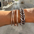 Lot joncs bouddhistes et bracelets népalais - champagne