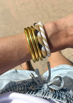 Lot joncs bouddhistes et bracelets népalais - light gold