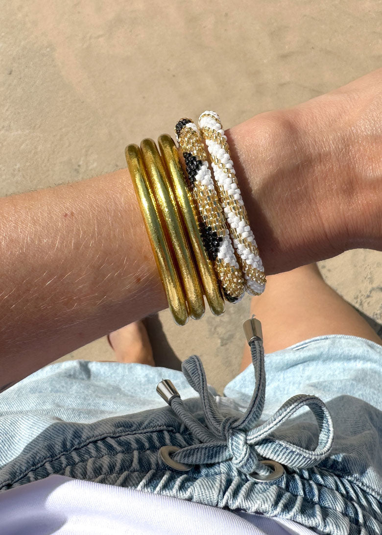 Lot joncs bouddhistes et bracelets népalais - light gold