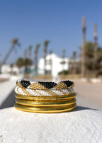 Lot joncs bouddhistes et bracelets népalais - light gold