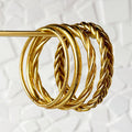 Lot de 4 joncs bouddhistes - light gold